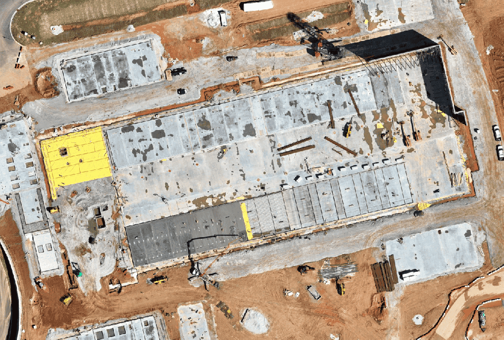 Construction site progress Day 1 - aerial satellite view showing daily evolution and timeline tracking for project monitoring